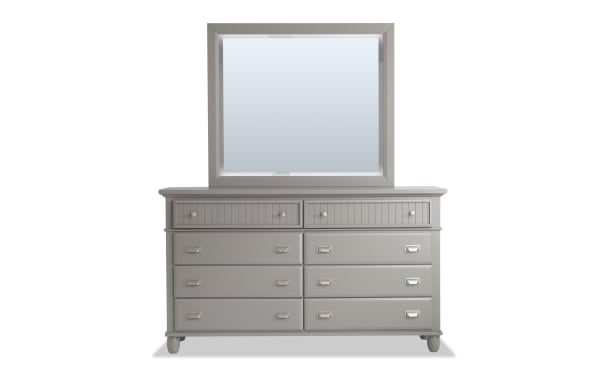 Spencer Gray 8 Drawer Dresser & Mirror in transitional style with gray hardwood solids, MDF, plywood, and poplar. Features eight spacious drawers with metal handles and a large matching framed mirror. Ideal for stylish, functional bedroom storage.