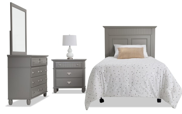 Spencer 4 Piece Twin Gray Panel Bedroom Set with headboard, dresser with mirror, and nightstand in transitional style. Made of hardwood solids, MDF, plywood, poplar, and veneers. Features gray finish, paneled headboard, multiple storage drawers with metal pulls, and rounded feet for organized, budget-friendly bedroom furniture.