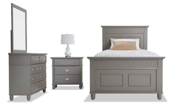 Spencer 4 Piece Twin Gray Panel Bedroom Set in transitional style, featuring hardwood solids, MDF, and poplar with multiple storage drawers, dresser with mirror, nightstand, and twin bed with paneled headboard and footboard.