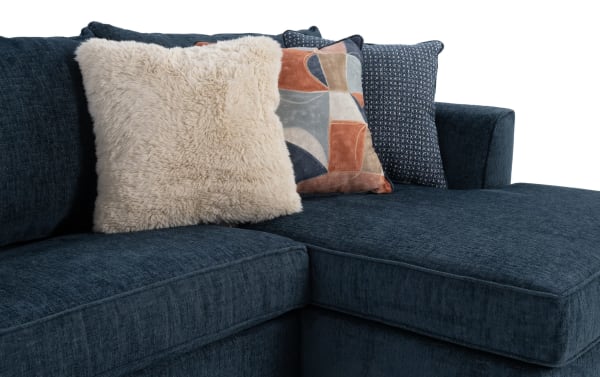 Brynn Navy 142'' 3 Piece Dual Chaise Sectional in soft navy polyester fabric with Bob-O-Pedic Memory Foam cushions and mixed textured accent pillows.