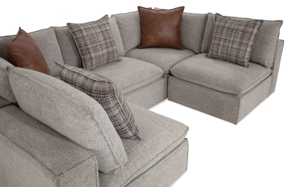 Infinity Gray 117'' 5 Piece Modular Sectional in transitional style, gray polyester fabric with Bob-O-Pedic® seats, feather blend pillows, and Siberian pine frame.