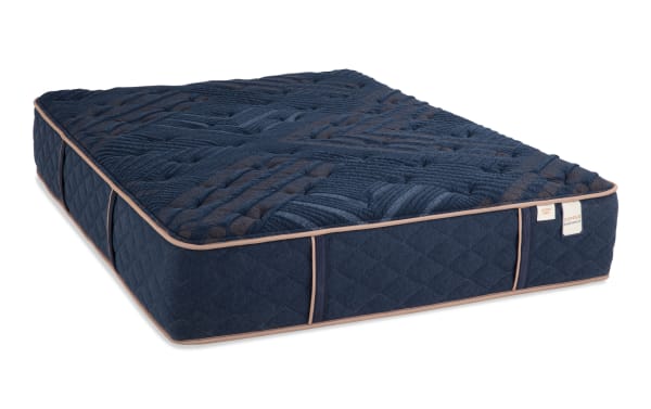 Copper Radiance 13'' King Extra Firm Mattress with navy blue copper-infused quilted cover, gel-infused layers, and individually wrapped coils for firm support.