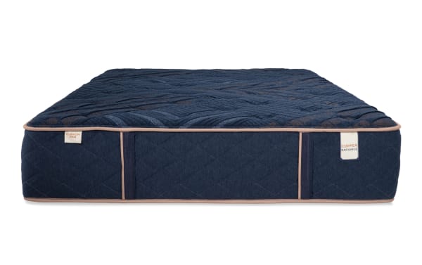 Copper Radiance 13'' Twin XL Firm Mattress with navy blue quilted copper-infused cover, cushion firm hybrid design, and premium gel layers.