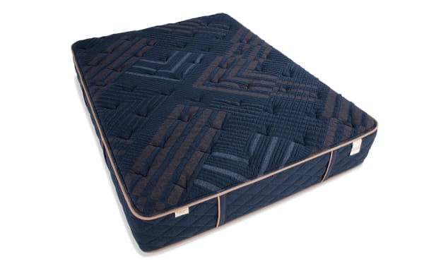 Copper Radiance 13'' Twin XL Firm Mattress with copper-infused navy blue quilted cover, gel-infused layers, and hybrid coil design for firm support.
