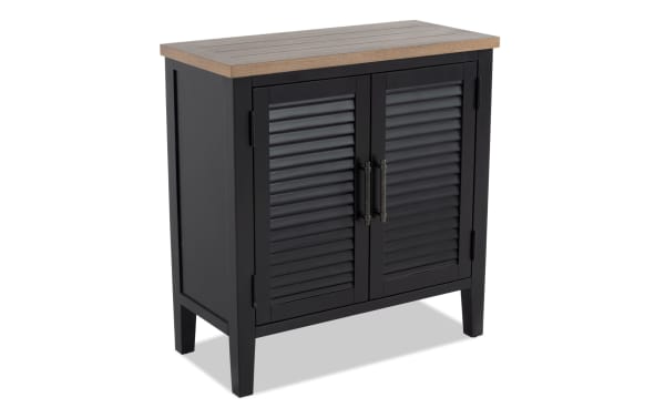 Sawyer Black 2 Door Cabinet in farmhouse style, made of rubberwood, MDF, and plywood, featuring black louvered doors and natural wood top.