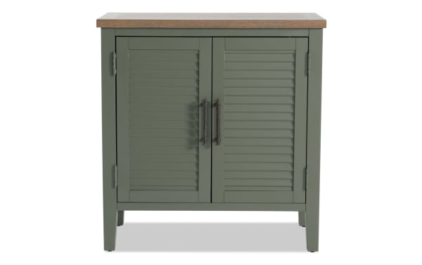 Sawyer Green 2 Door Cabinet in farmhouse style, made of rubberwood, MDF, and plywood with adjustable shelves and shutter-style green doors.