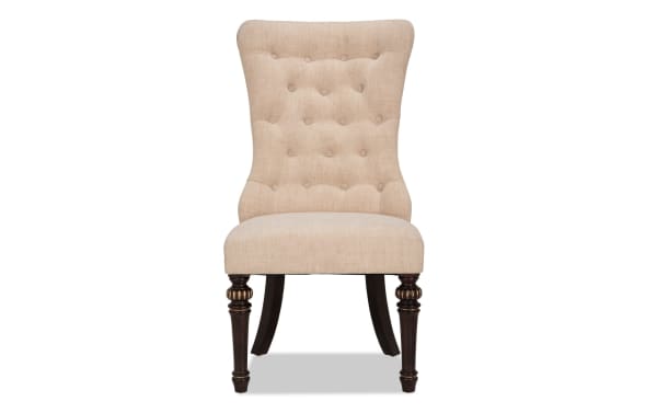 Regency Beige Solid Back Dining Chair with tufted beige polyester fabric, nailhead trim, and cushioned Bob-O-Pedic Memory Foam seat. Traditional style with dark wood legs from the Regency Dining collection.