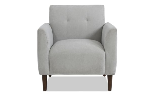 Maxwell Gray Accent Chair in transitional style with gray polyester fabric upholstery, button tufting, and flared track arms on wooden legs.