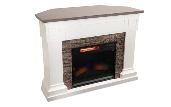 Stonebrook 23.5'' white and brown transitional electric fireplace with MDF frame, stone surround, realistic faux flames, and heating function.