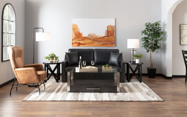 Black leather Bob-O-Pedic® Twin Pop-Up Sleeper Chair in transitional style with slope arms, accent pillows, and memory foam cushions, shown in a modern living room setting.