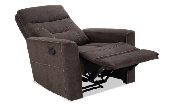 Reid Charcoal Manual Recliner in gray polyester fabric with padded seating, transitional style, and manual recline lever for comfort and relaxation.