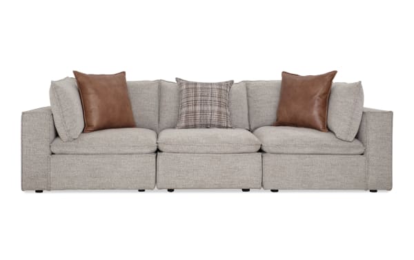 Infinity Gray 120'' 3-piece modular sofa in gray polyester fabric with transitional style, featuring two corner seats, one armless chair, and mixed accent pillows.
