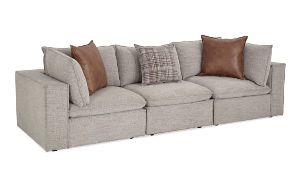 Infinity Gray 120'' 3-piece modular sofa in gray polyester fabric with 2 corner seats, 1 armless chair, feather-blend pillows, and wood frame