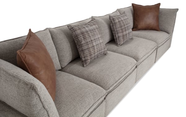 Infinity Gray 117'' 4-piece modular sectional in gray polyester fabric with two armless chairs, two corners, feather blend pillows, and wood frame.