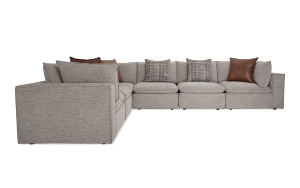 Transitional Infinity Gray 150'' 6-piece modular sectional with gray polyester fabric, including 3 armless chairs, 3 corners, feather blend accent pillows, and removable cushions.