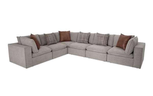 Transitional Infinity Gray 150'' 6-piece modular sectional with gray polyester fabric, Siberian pine frame, 3 armless chairs, 3 corners, and mixed accent pillows.