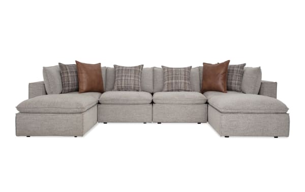 Transitional Infinity Gray 150'' 6-piece modular sectional with gray polyester fabric, includes 2 armless chairs, 2 corners, 2 ottomans, feather-blend pillows, and removable cushions.