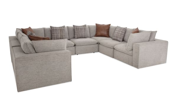 Transitional Infinity Gray 151'' 8-piece modular sectional with 4 armless chairs, 4 corners, gray polyester fabric, feather blend pillows, and sturdy Siberian pine frame.