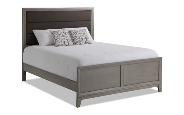 Tremont 4 Piece Queen Gray Panel Bed with upholstered fabric headboard, rubberwood solids and veneers in a transitional style.