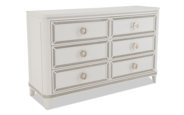 Glitz White 6 Drawer Dresser in glam style with poplar solids, chrome hardware, mirrored crystal trim, and LED-lit textured accents from Glitz Bedroom Collection.