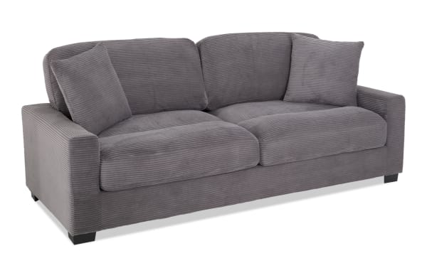 Aspen Charcoal 86'' Sofa in gray polyester fabric with plush corduroy texture, transitional style, memory foam cushions, and included accent pillows.