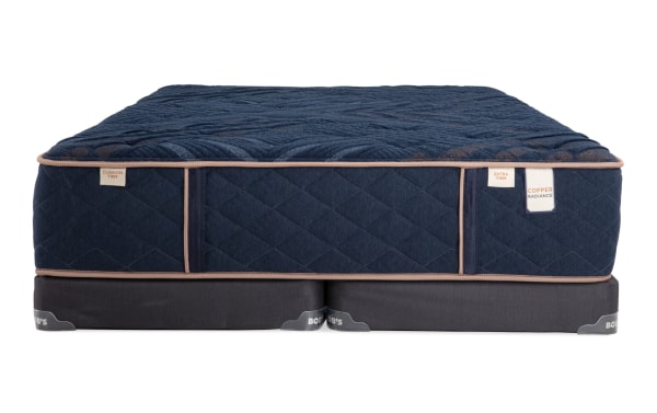 Copper Radiance 13'' King Dual Split Low Profile Mattress Set in navy blue with quilted copper-infused cover, gel-infused layers, and memory foam foundation by Bob-O-Pedic.
