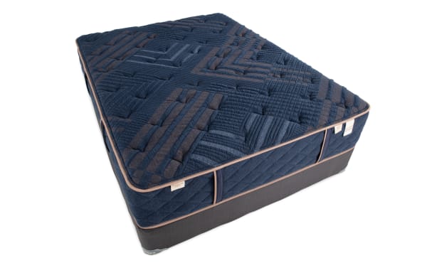 Copper Radiance 13'' Queen Dual Standard Mattress Set with navy blue copper-infused quilted cover, gel-infused layers, and memory foam foundation.