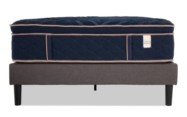 Copper Radiance 14.5'' Queen Plush Universal Mattress Set with navy blue copper-infused quilted cover, plush hybrid design, and gray universal foundation.