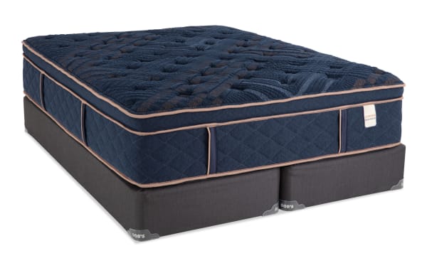 Copper Radiance 14.5'' King Plush Split Standard Mattress Set with navy quilted copper-infused cover, plush hybrid design, and dark gray foundation by Bob's.