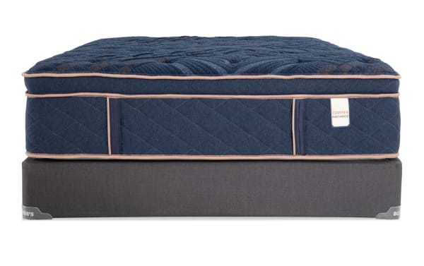 Copper Radiance 14.5'' Twin XL Plush mattress set with navy blue quilted copper-infused cover, plush hybrid gel layers, and dark gray foundation by Bob-O-Pedic.