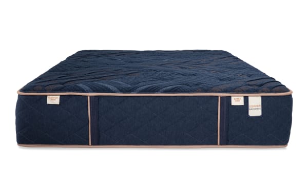 Power Bob Essential Base with Copper Radiance 13'' Queen Dual Mattress in navy blue, quilted copper-infused cover, firm and extra firm labels, Copper Radiance collection.