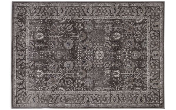 Amelia 8' x 10' brown Oriental rug with vintage floral and leaf motifs in transitional style, made of soft polyester fabric.