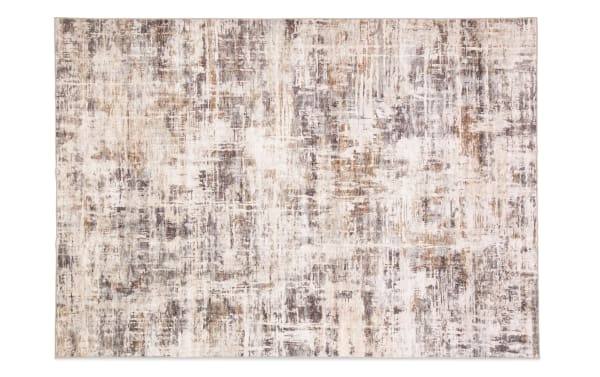 Wells 5' x 7' Brown Abstract Washable Rug features a low pile, transitional style with a brown abstract pattern on durable polyester fabric, ideal for high-traffic areas.