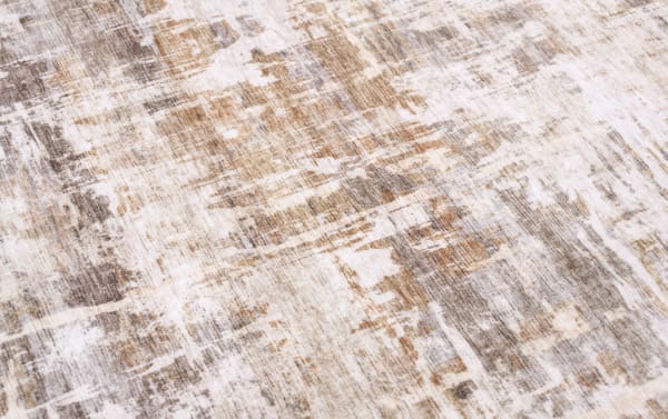 Wells 5' x 7' brown abstract washable rug with low pile, transitional style, and durable polyester fabric featuring a textured, multi-tone brown pattern.