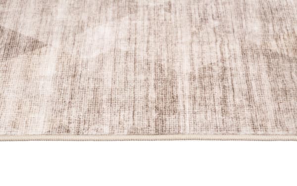 Wells 2' x 4' Brown Abstract Washable Rug with low pile, transitional style, and durable polyester fabric featuring a subtle abstract brown pattern.