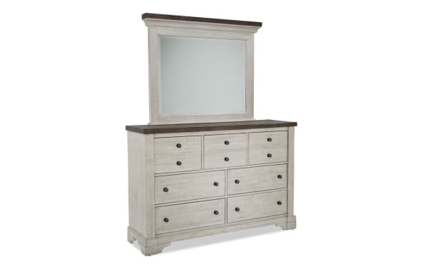 Beaumont White & Gray 7 Drawer Dresser & Mirror in traditional style, crafted from pine solids, veneer, and MDF with ball bearing guides, dovetail fronts, felt and cedar-lined drawers, featuring a large framed mirror and contrasting dark top surfaces.