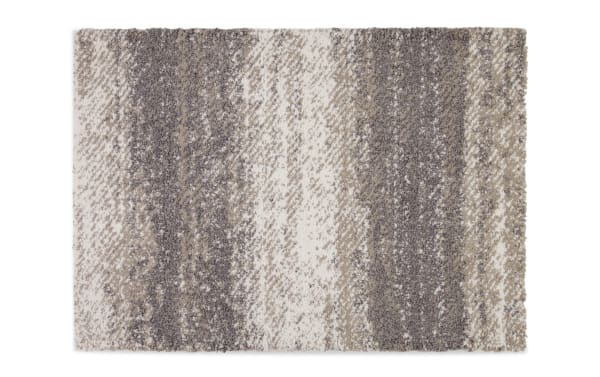 Oliver 5' x 7' White & Gray Striped Shag Rug with soft polyester fabric, featuring multicolored vertical stripes for a cozy, stylish home accent.