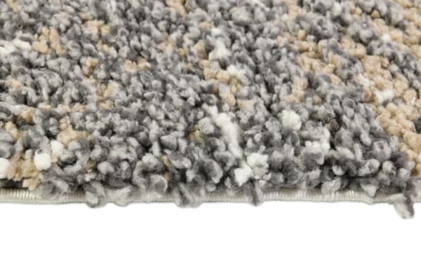 Oliver 5' x 7' White & Gray Striped Shag Rug with plush polyester fabric, featuring a multicolored striped pattern and soft textured pile for cozy home decor.