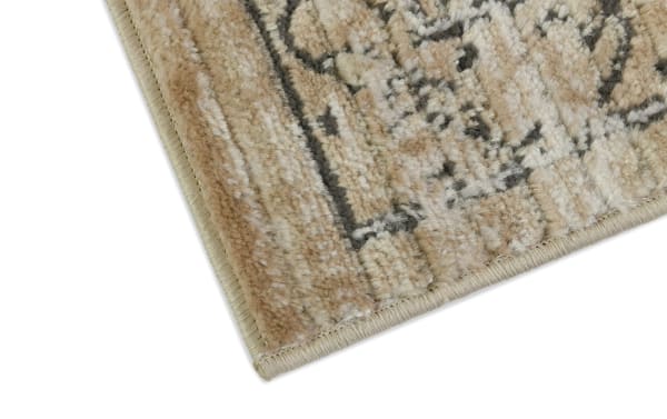 Beige and ivory Benny 8' x 10' Oriental rug with low pile polyester fabric, vintage-inspired design ideal for high-traffic living spaces.