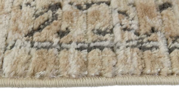 Low pile Benny 8' x 10' beige and ivory oriental rug with vintage-inspired pattern, made of durable polyester fabric for high-traffic areas.