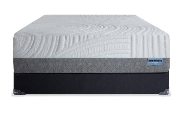 Twilight 15.5'' Twin XL Firm Standard Mattress Set from Bob's Twilight collection, featuring white quilted top with circular patterns, gray side panel with textured circles, and black foundation base. Includes ventilated Bob-O-Pedic Gel Memory Foam with Charcoal for cooling and zoned support.