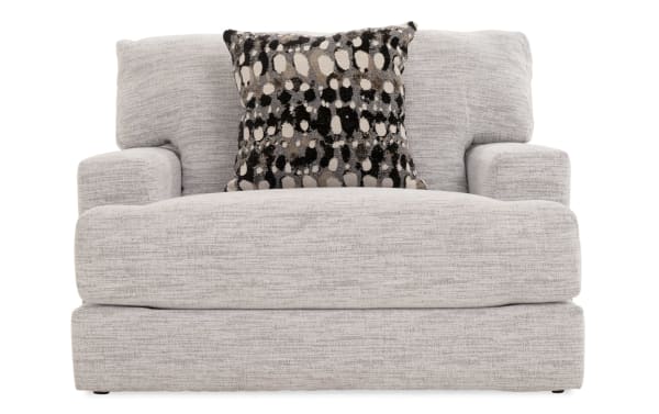 Glacier White Chair in transitional style with plush white polyester fabric upholstery, memory foam cushions, and a patterned accent pillow.