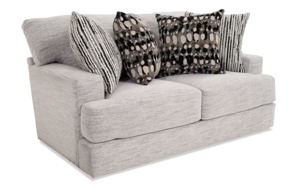 Glacier White 70'' Loveseat in transitional style with plush white polyester fabric, Bob-O-Pedic memory foam cushions, and four patterned accent pillows.