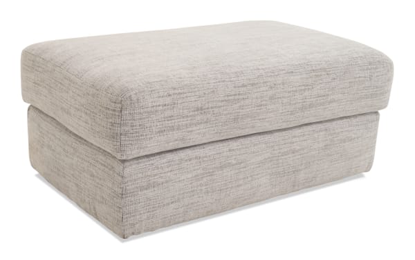 Glacier White Ottoman in transitional style with plush white polyester fabric and Bob-O-Pedic Memory Foam cushion for seating or footrest.