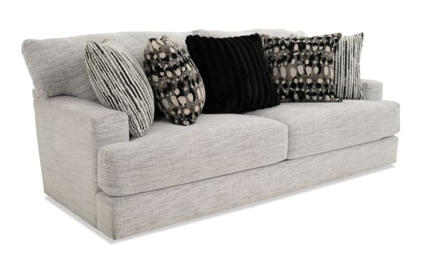 Glacier White 93'' transitional sofa with plush white polyester fabric, Bob-O-Pedic memory foam cushions, and five patterned accent pillows.