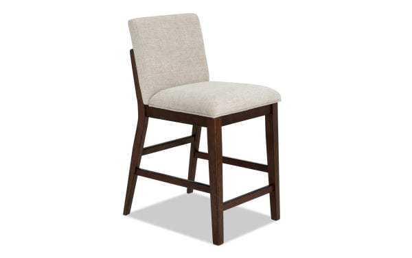 Contemporary Mango Dining counter height stool with beige polyester fabric upholstery, solid mango wood frame, and memory foam seat for comfort.