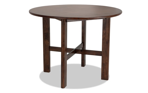 Mango Brown solid wood round dining table in contemporary style with counter-height, sturdy four-leg base, and rich brown finish from Mango Dining collection.