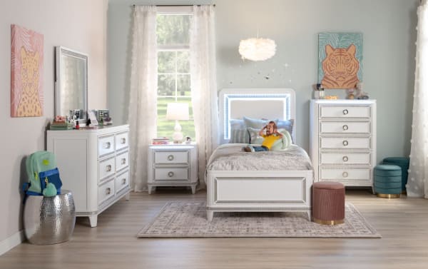 Glitz Full White Bed from Glitz Bedroom collection, featuring white MDF and poplar solids with soft polyester fabric upholstery, glam style, mirrored crystal trim, and selectable seven-color LED lights on headboard and footboard.