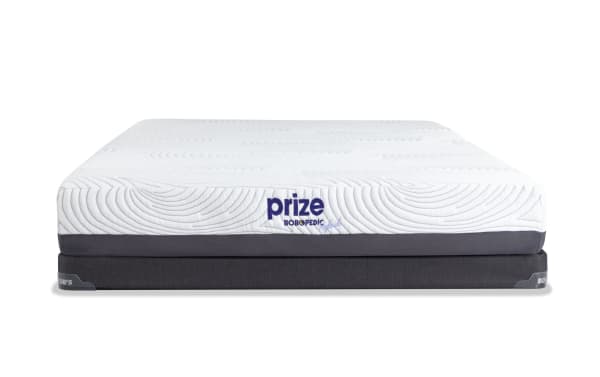 Prize Hybrid 10'' Twin Firm Low Profile Mattress Set with white quilted top, gray side panel, and dark gray foundation, featuring ventilated gel memory foam and transition foam for support and temperature regulation.