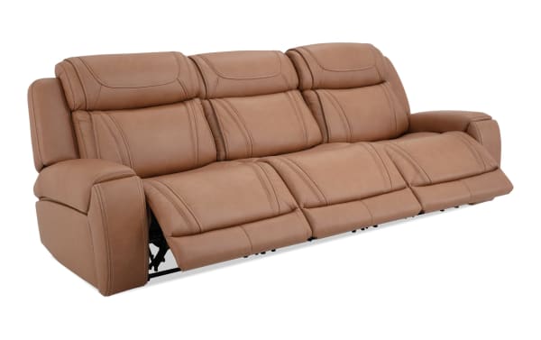 Dynamic Cognac Leather 110'' Power Reclining Sofa with armless recliner, power headrests, cupholders, and brown leather upholstery in transitional style